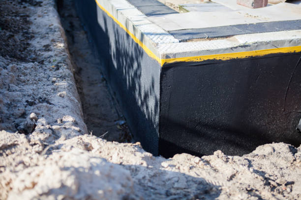 Professional Emergency Waterproofing technician working in Kempton, IN